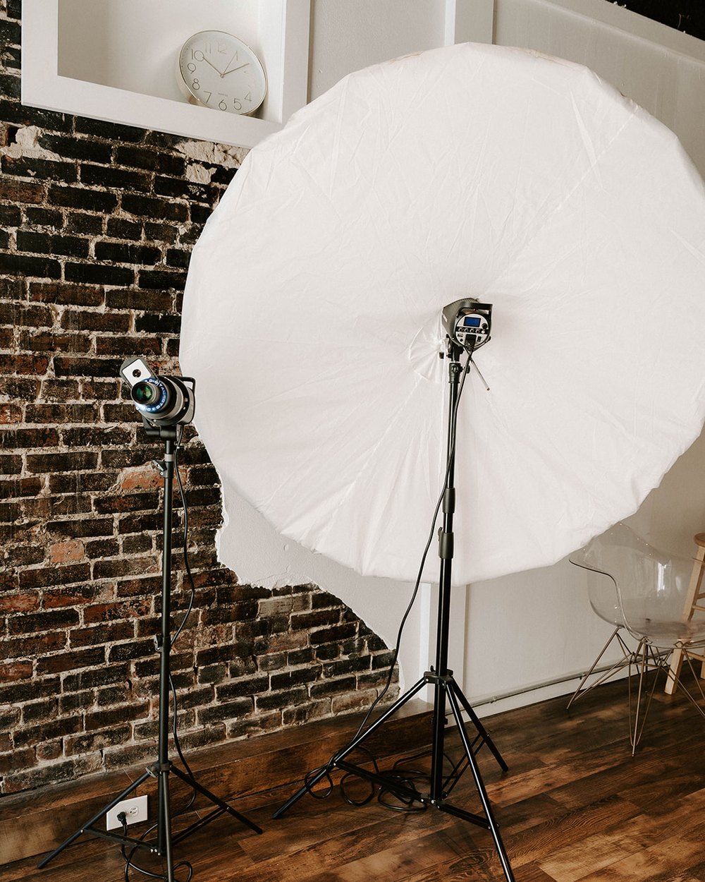 Godox strobe with white umbrella