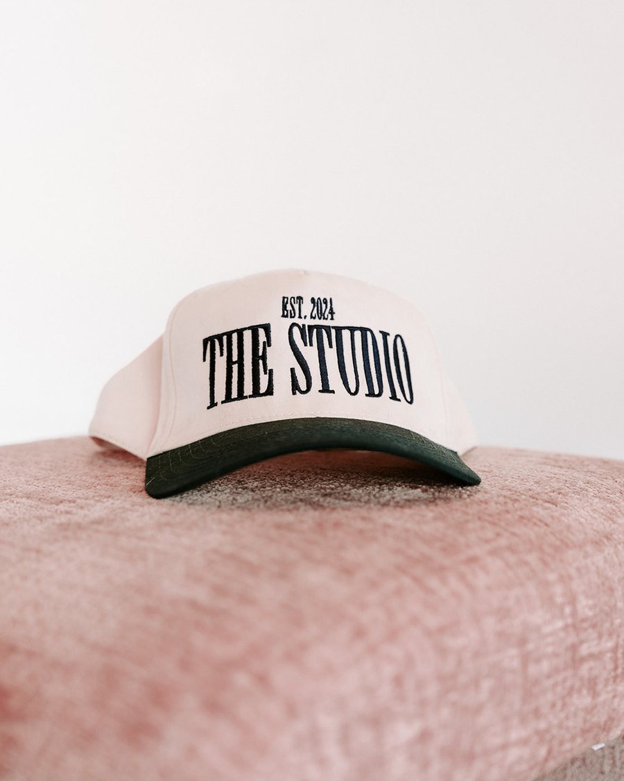 The Studio ballcap on a velvet chair